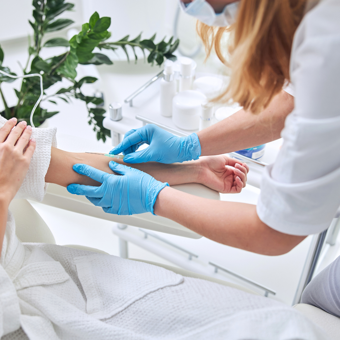 woman receiving iv hydration therapy